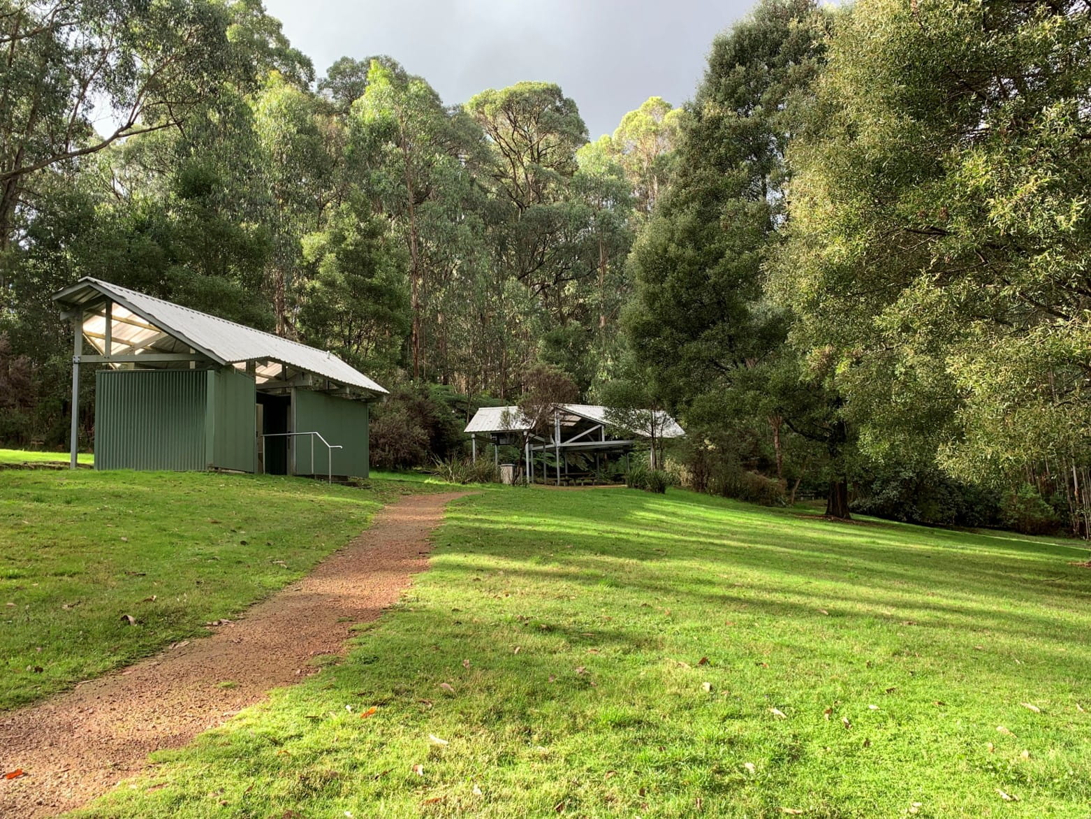 Path to toilet, picnic shelter and barbecue