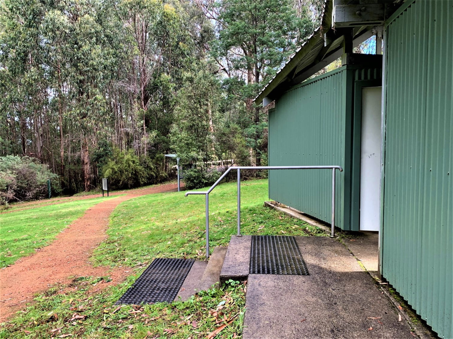 Tactile paving on steps of the accessible toilet