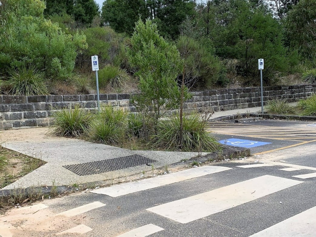 Disabled parking bay connected to pedestrian path