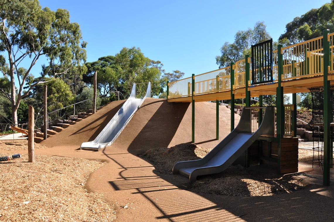 Three slides come off the side of the double storey tram fort in the new Wattle Park playscape.