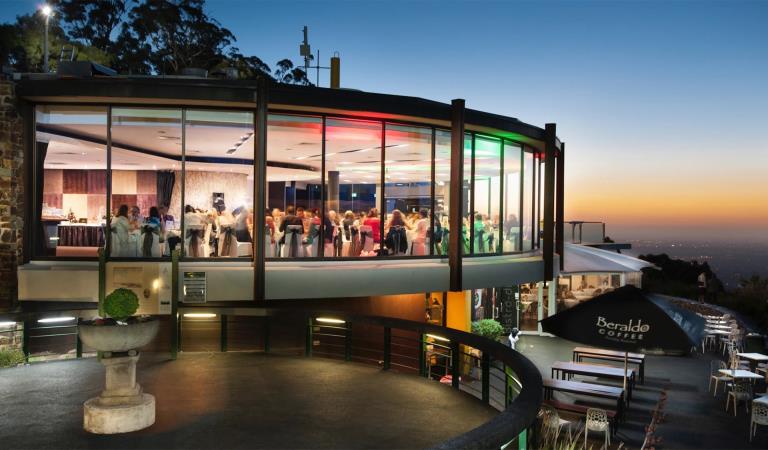 View of Sky High building at night.