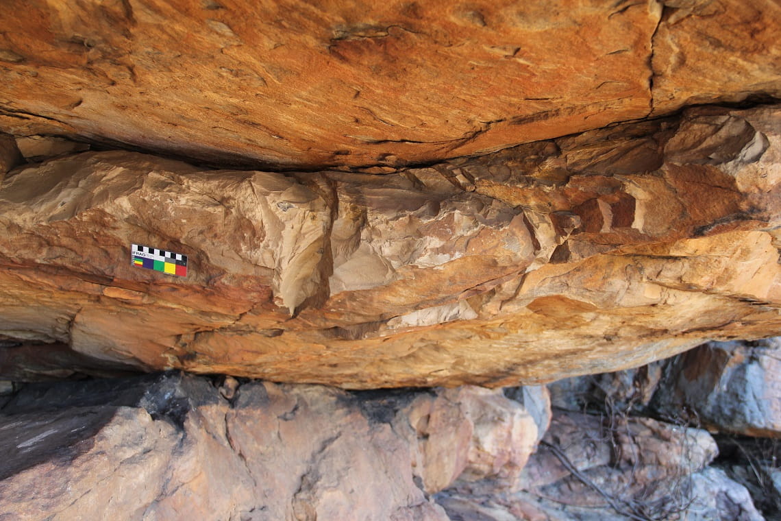 Scars on a rock shelter where stone has been quarried