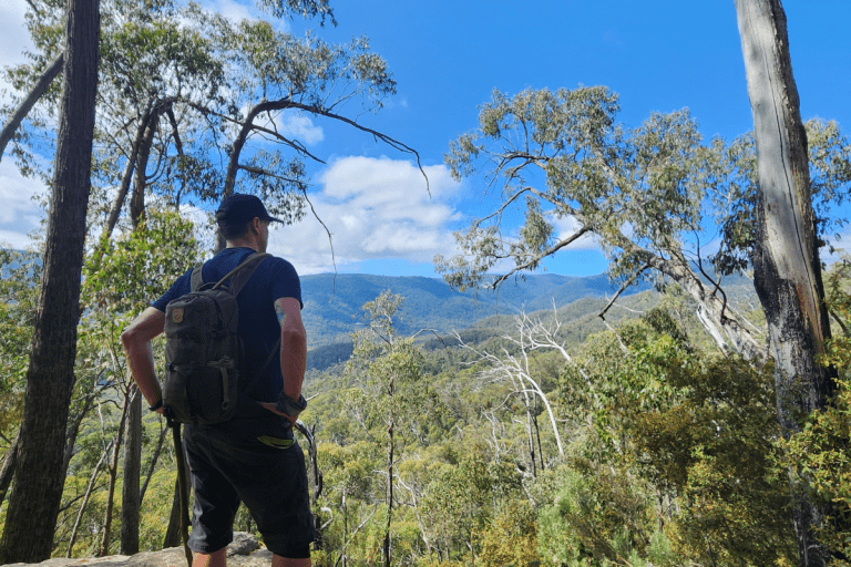 Hiker looking out to mountain views at Cathedral Range State Park