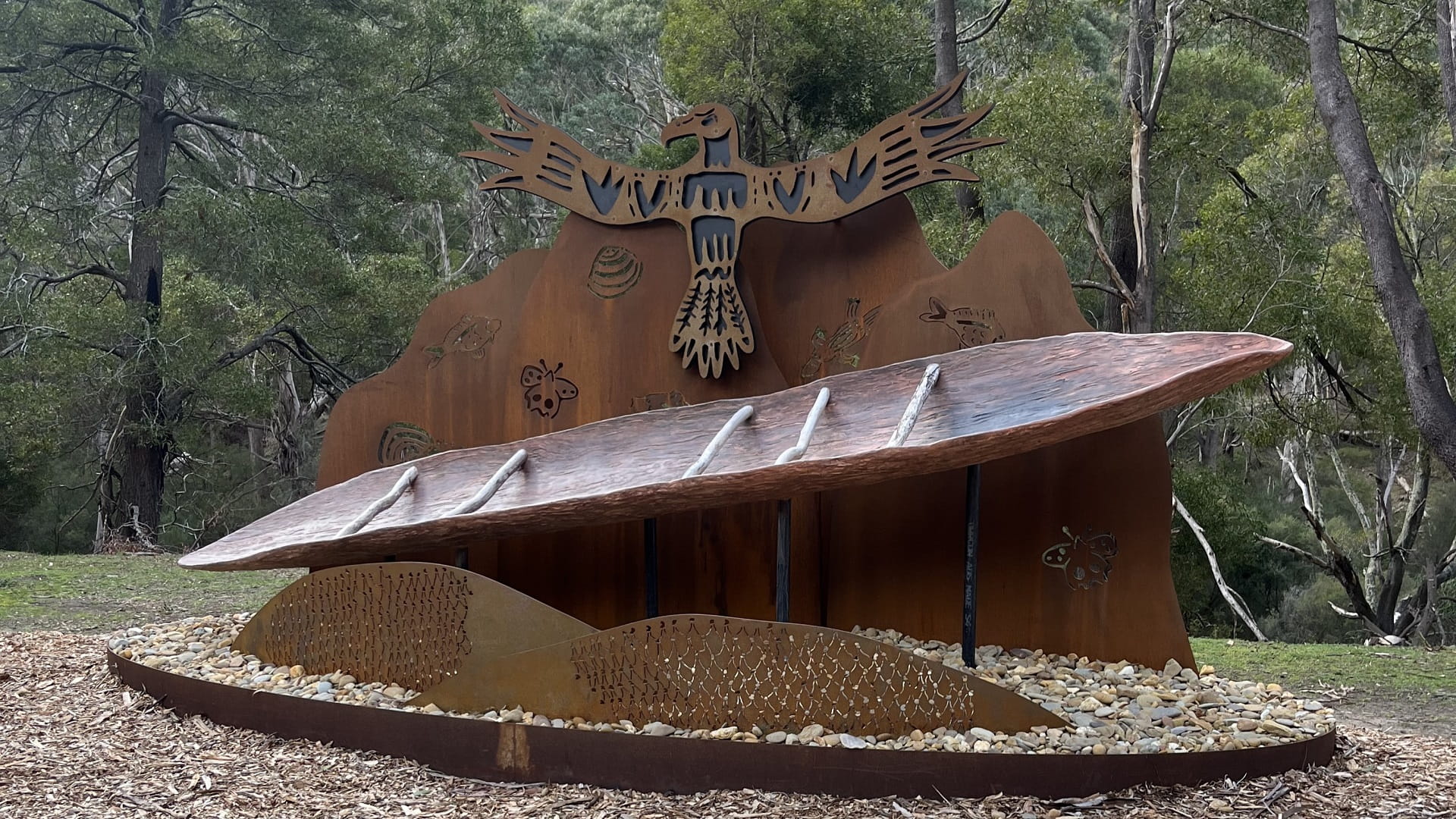 Yunguip Beal, an outdoor scuplture featuring Bunjil and a Redgum canoe