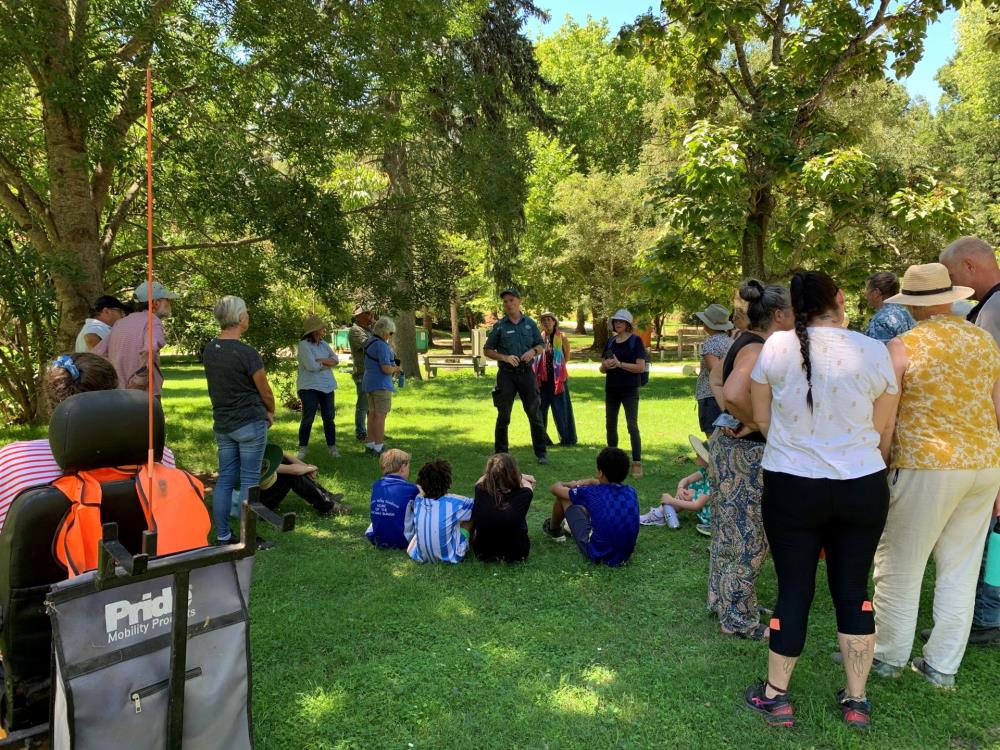 A group of people attending the community tour after the floods at Buchan Caves Reserve