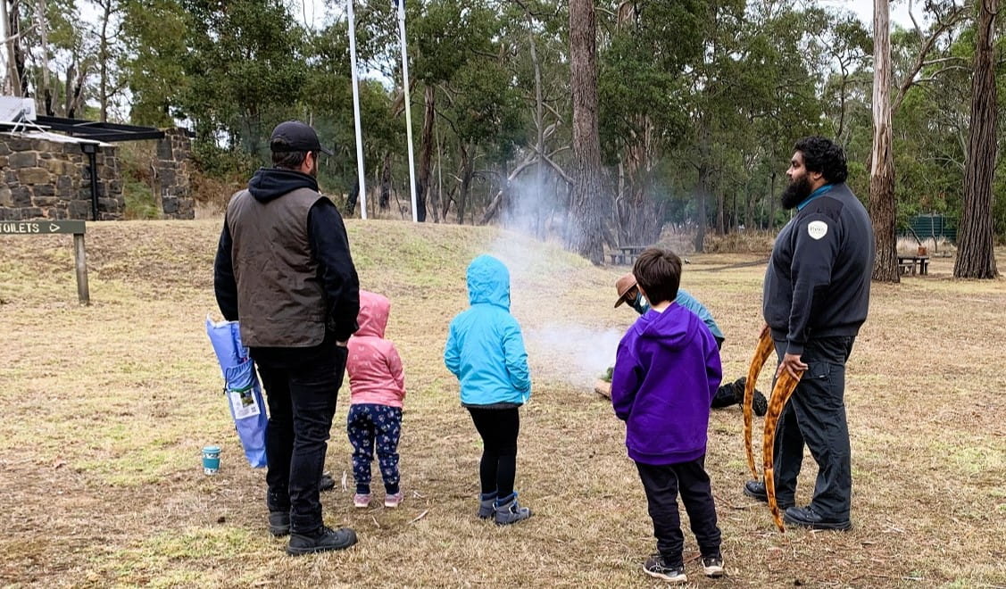 The smoke of the Cherry Ballart tree is used in a Welcome ceremony for Junior Ranger families 