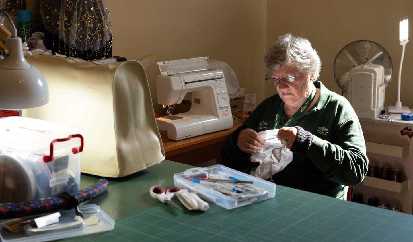 Volunteer sewing group member