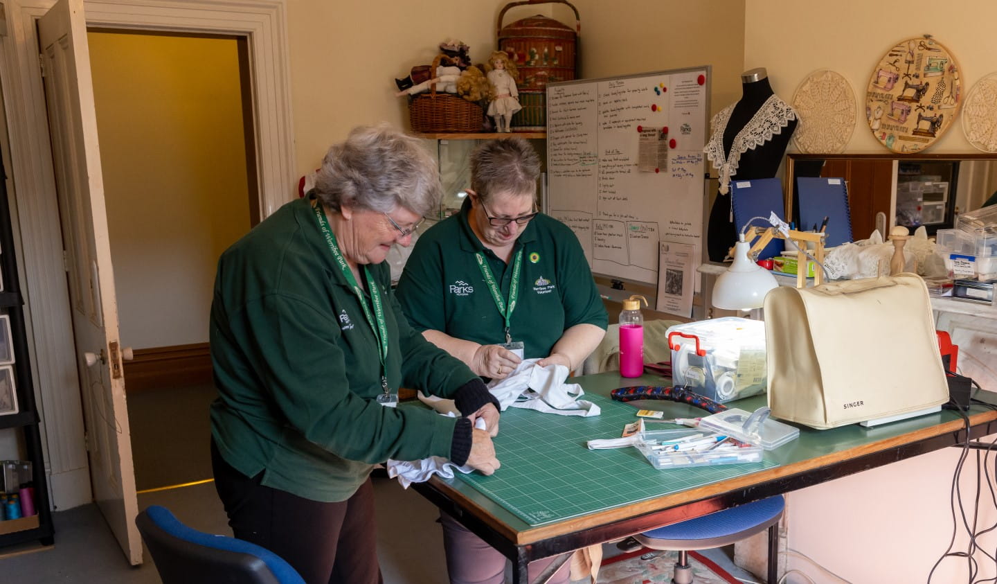 Volunteers work out of one of the rooms in the mansion