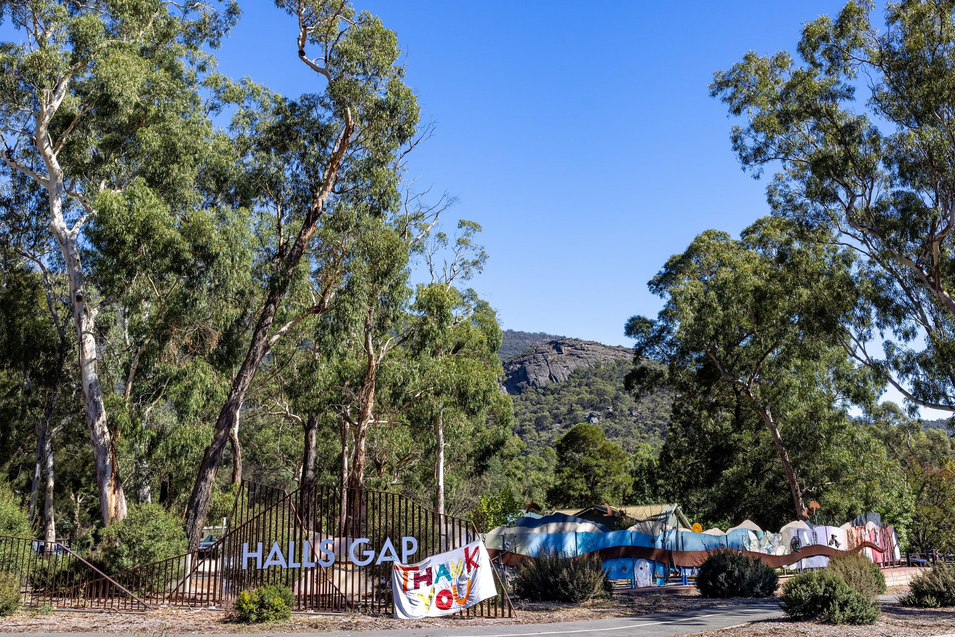 On the entrance to the town of Halls Gap, a thank you sign from the community to emergency workers' greets visitors.