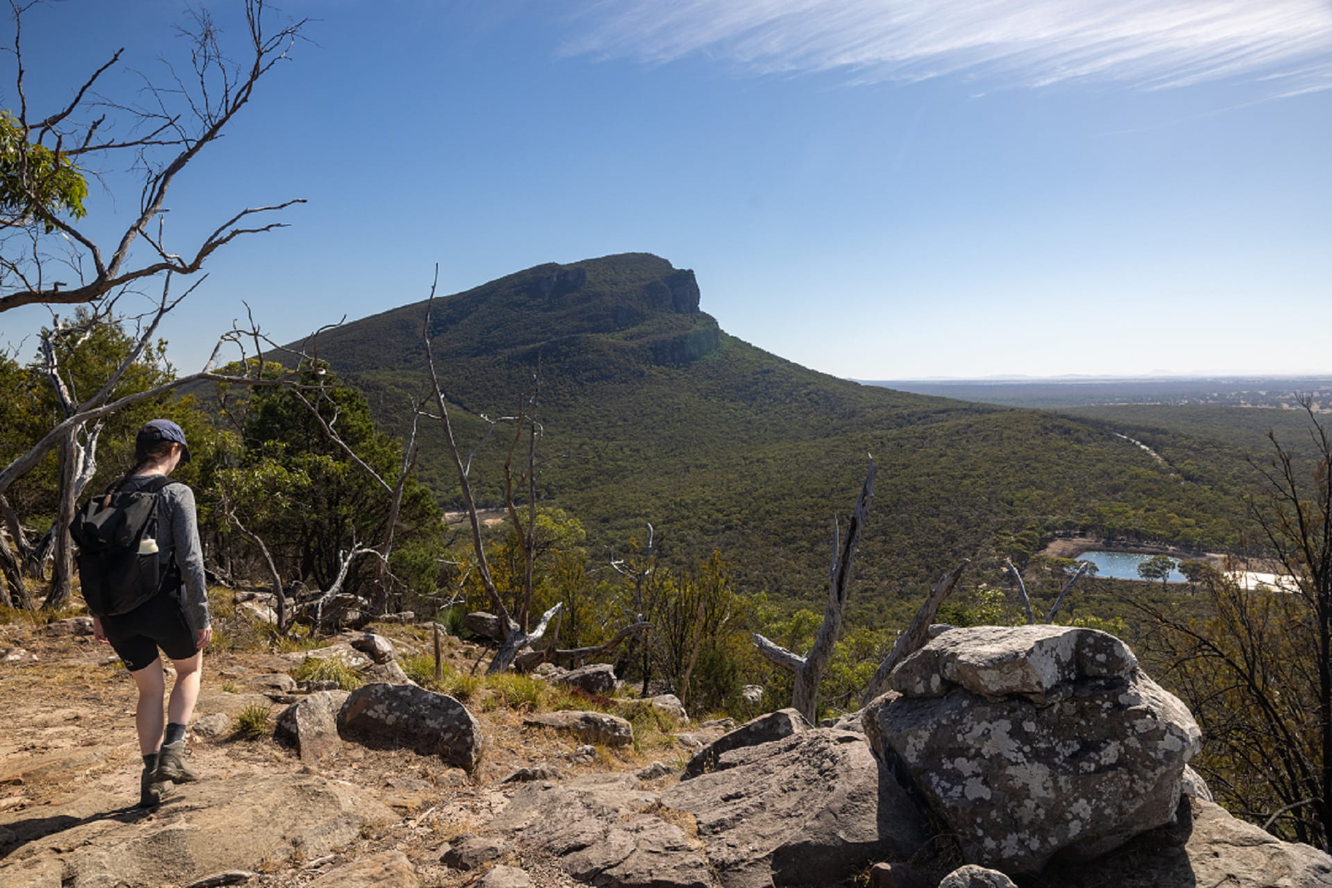 In the southern section of Grampians National Park, a visitor is on The Piccaninny (Bainggug) Walk with an excellent view of Mt Abrupt (Mud-Dadjug).