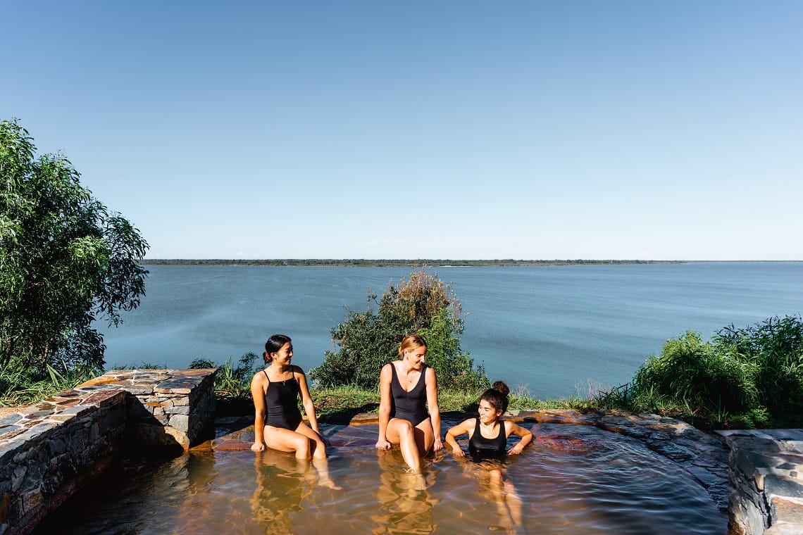 Friends enjoying the bathing experience at Metung Hot Springs.
