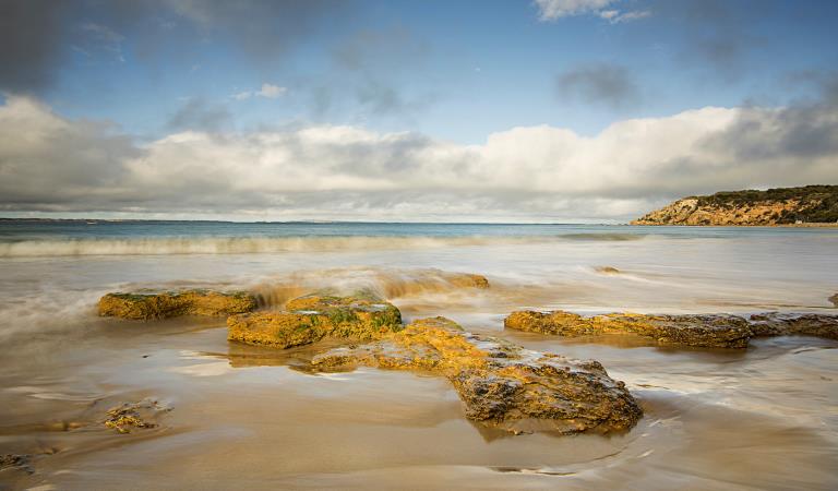 A rock formation near the waters edge at Barwon Bluff Marine Sanctuary