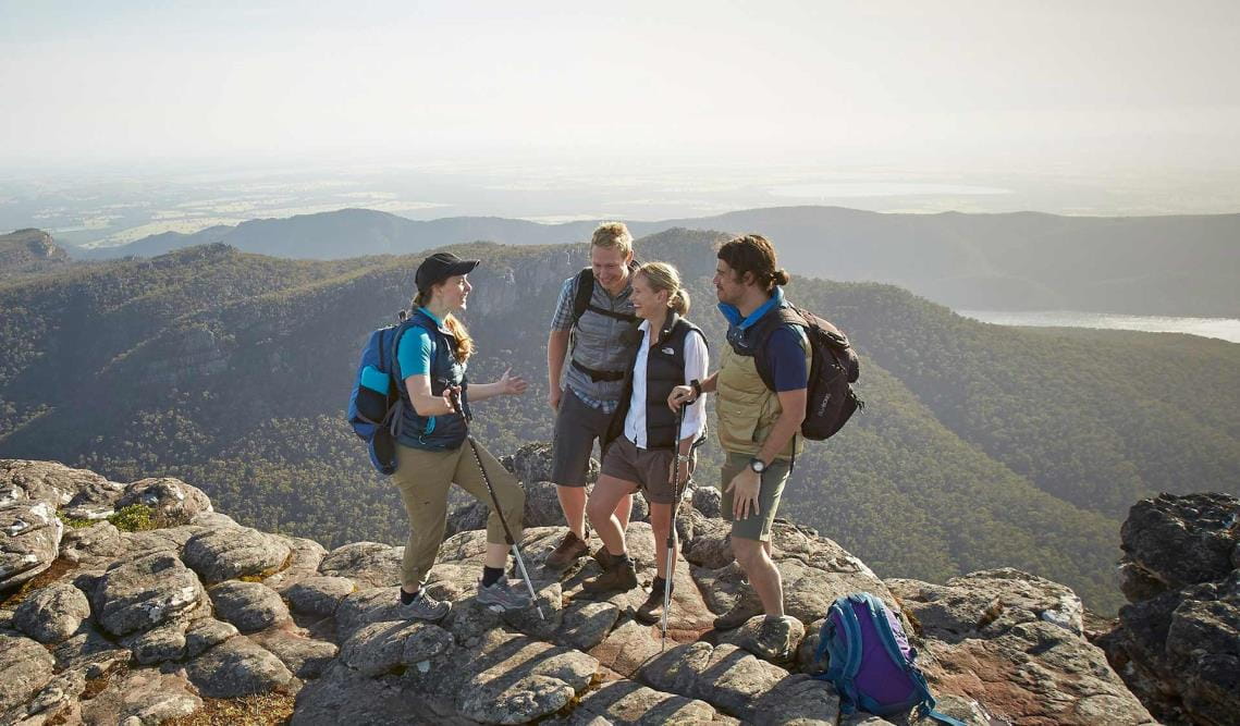 A group near the summit of Mount Rosea on Central Section 2 of the Grampians Peaks Trail