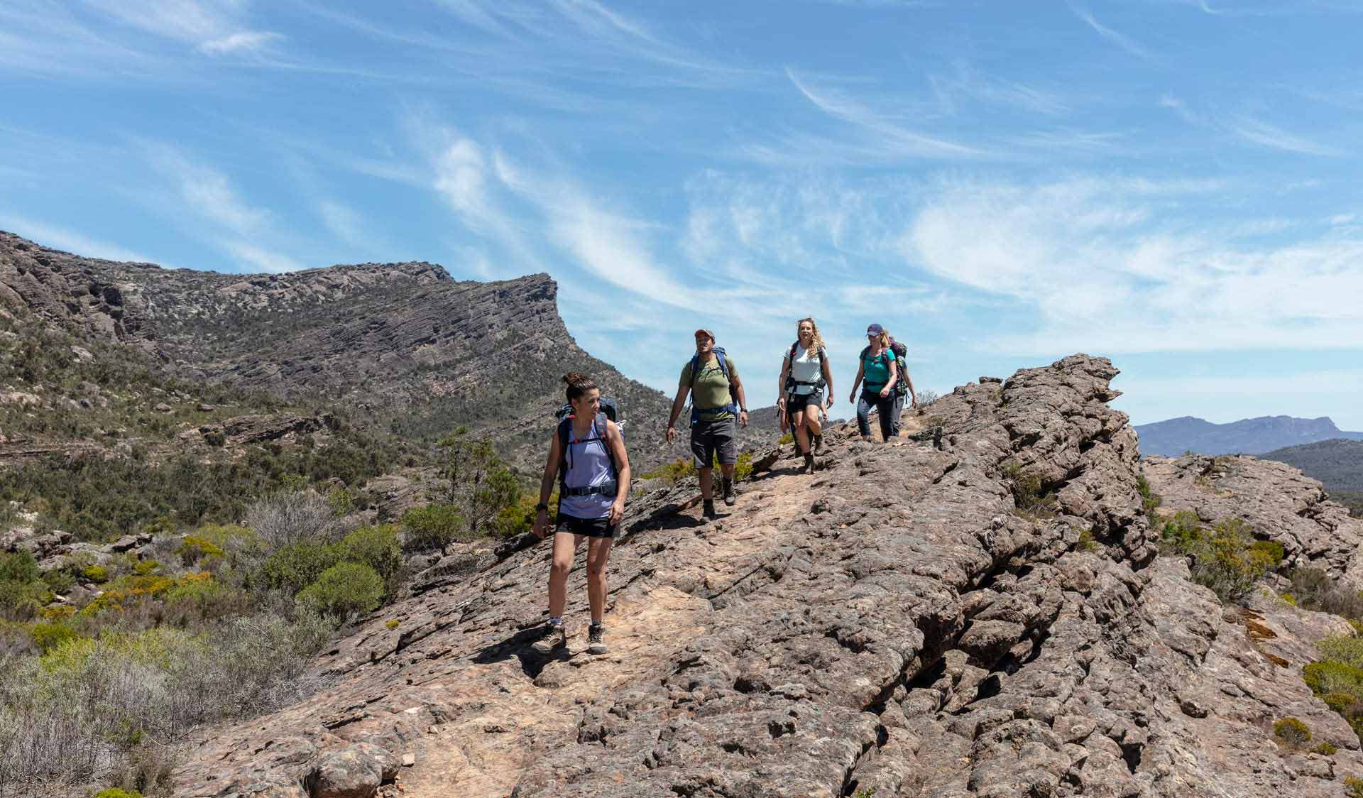 A group of walkers head along the trail in front of Gar on norther section 2 of the GPT