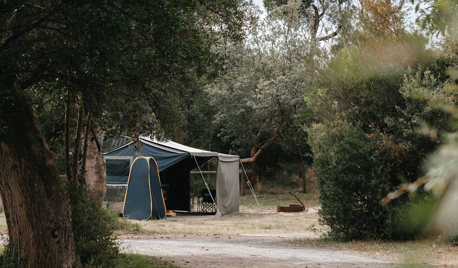 Large canvas family tent set up at the Corringle Foreshore Campground at Marlo Coastal Reserve