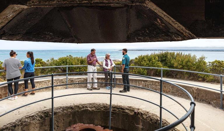 A retired coulpe chat with a Parks Victoria Ranger at Fort Nepean.