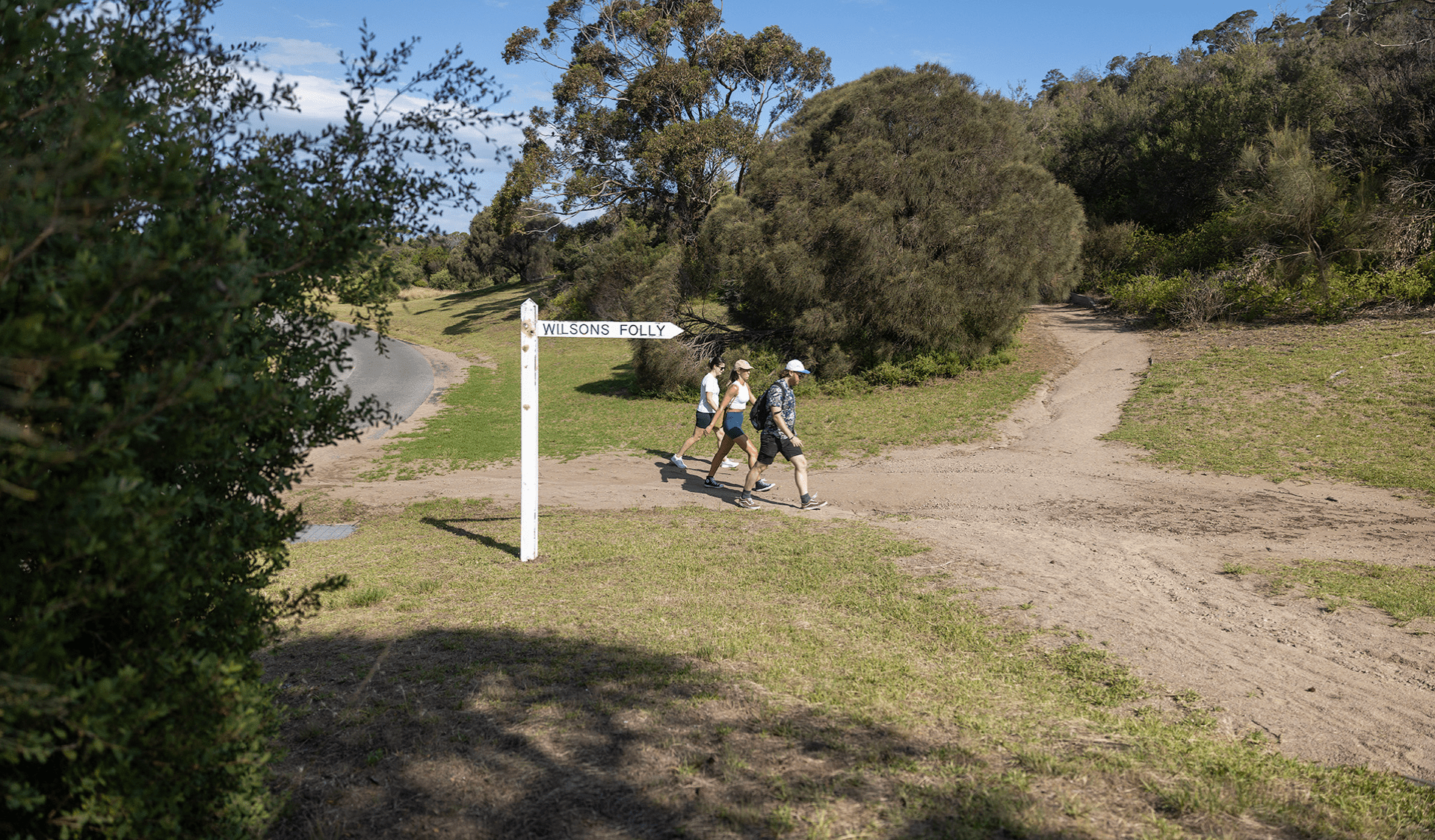 Three people at the beginning of the signed track, Wilsons Folly.