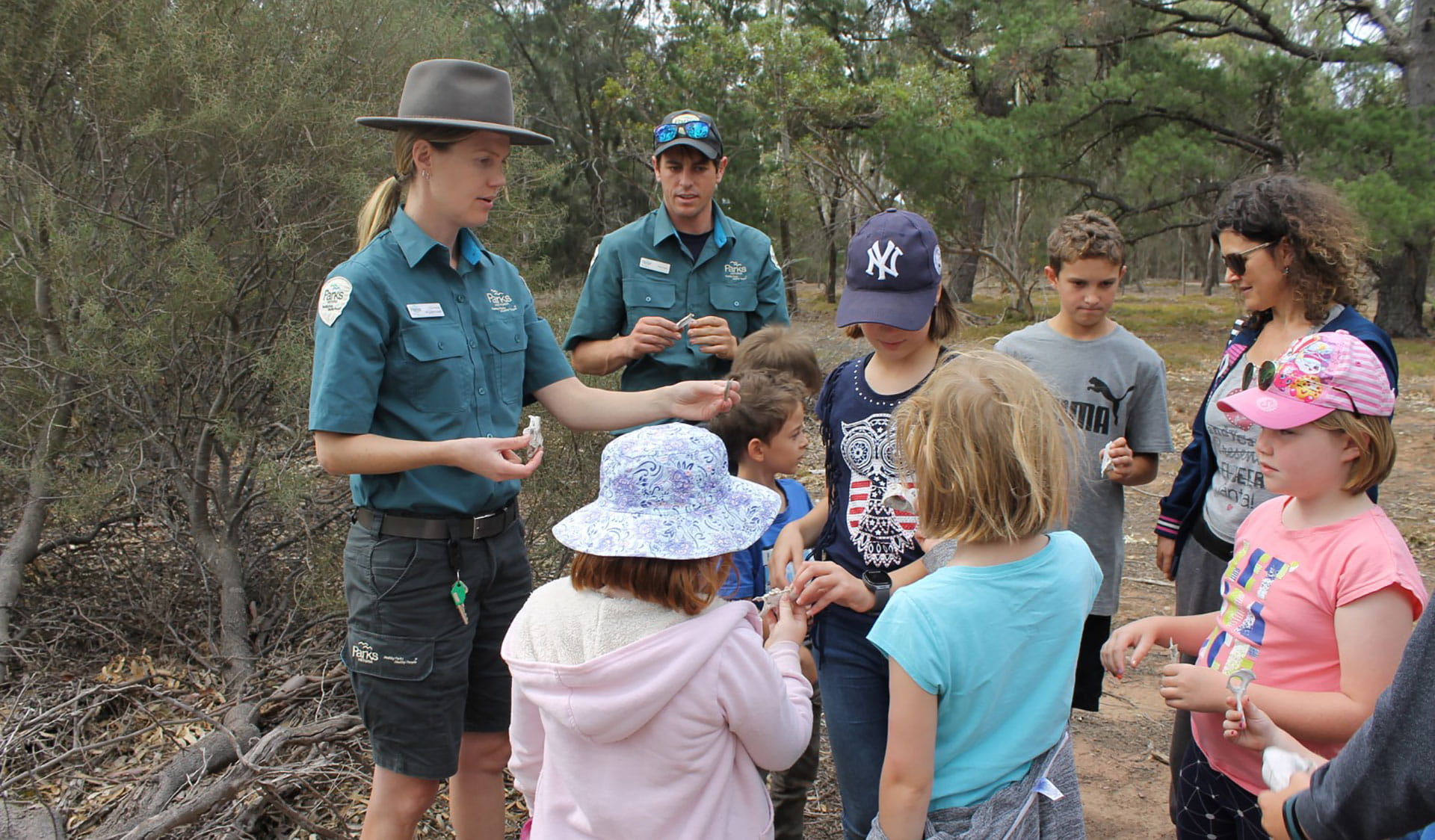 Rangers educating a group of children