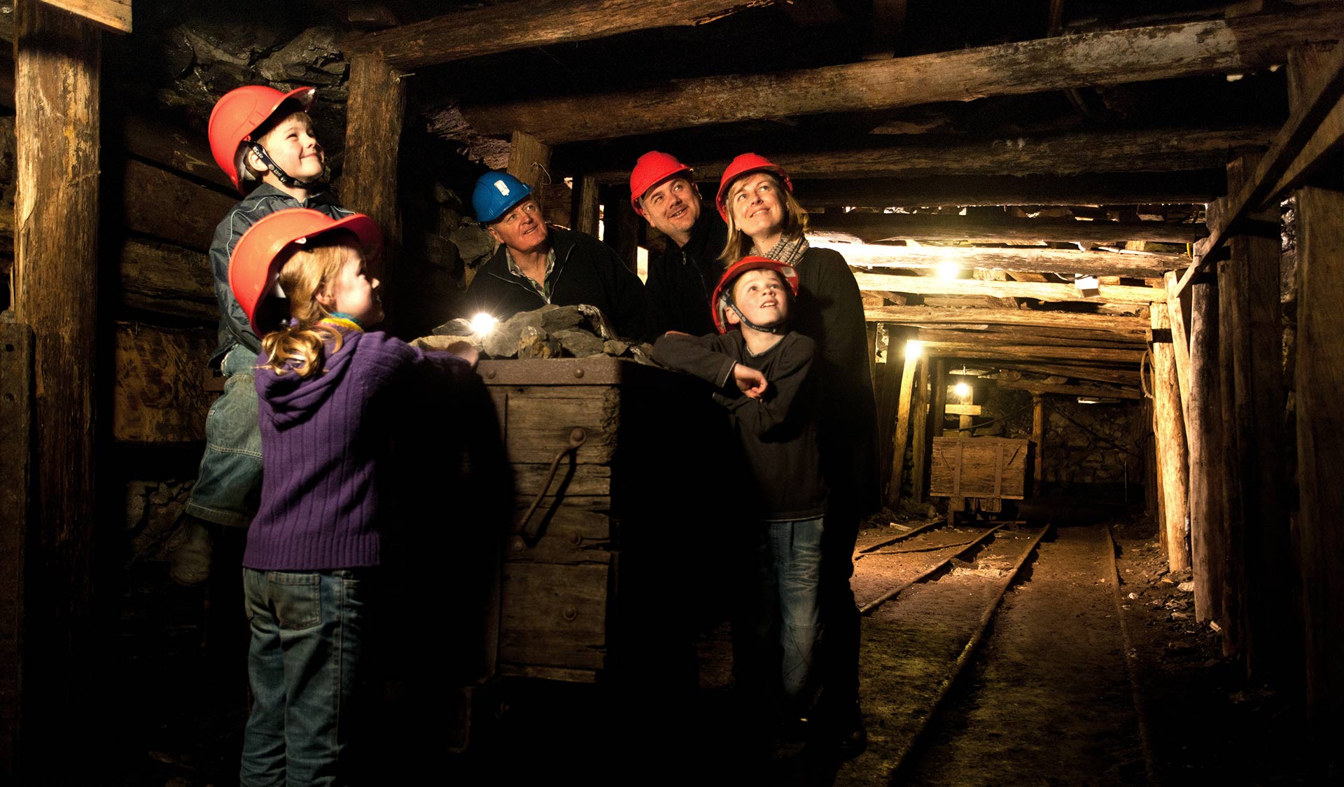 A family tours the underground mine shafts at the State Coal Mine.