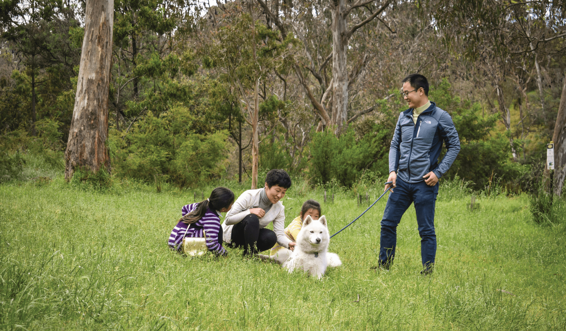 Family with their dog at Yarra Bend Park.