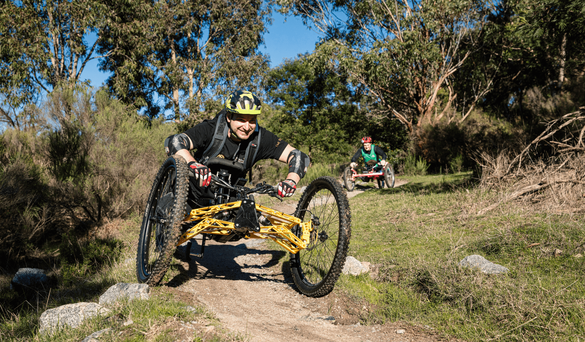 Lysterfield Park is one of the best places to mountain bike close to Melbourne, featuring trails for all abilities including many suitable for adaptive mountain bikes.
